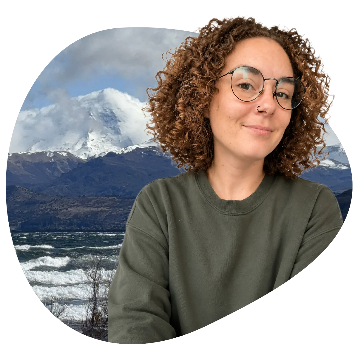 Victoria in Patagonia, mountains and lake behind her
